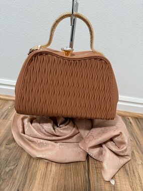 Elegant Tan Mini Top-Handle Bag with Gold Snake Handle Accent